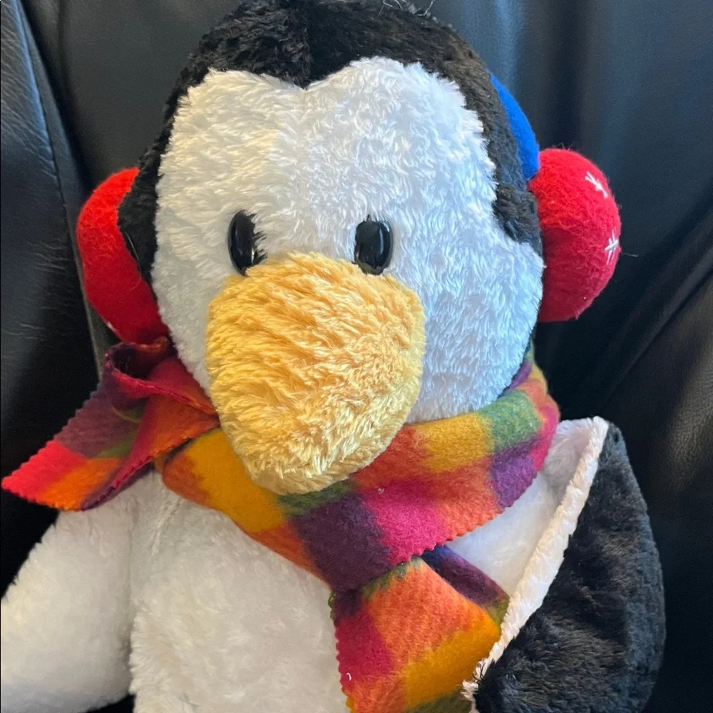 Penguin Plush with Colorful Scarf and Red Earmuffs